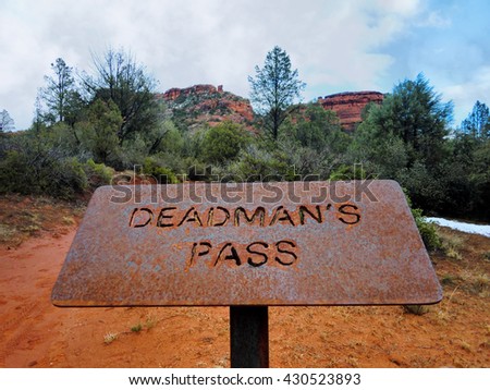 Sedona, Arizona hiking trail "Deadman's Pass" sign Royalty-Free Stock Photo #430523893