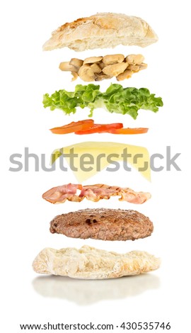 open sandwich, floating sandwich, burger sandwich with hamburger, bacon, cheese, tomato, lettuce and mushrooms