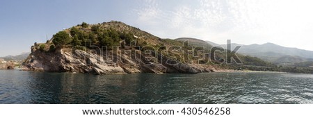 seascape with the water surface and the mountains of Montenegro