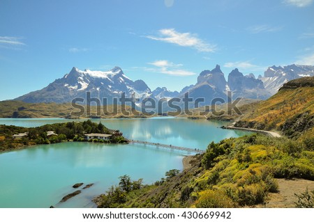 Lake from iceberg melting and rock mountain in the background at the Torres del Paine national park, Chile