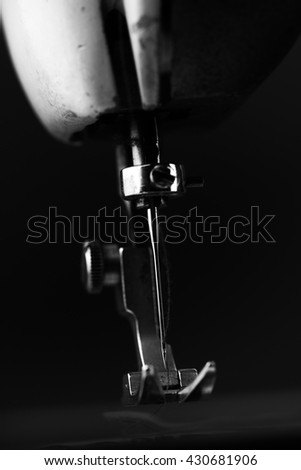 Old Sewing Machine - macro photo background - industry