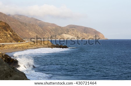 Beach landscape in Malibu. The ocean and waves during strong winds in United States, California. 