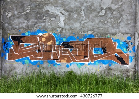 Beautiful street art of graffiti. Abstract color creative drawing fashion on walls ofÂ  city. Urban contemporary culture. Title paint on walls. Culture youth protest. ABSTRACT PICTURE