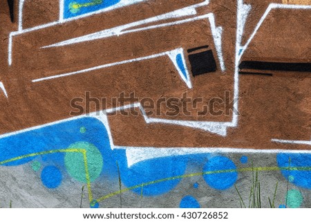 Beautiful street art of graffiti. Abstract color creative drawing fashion on walls ofÂ  city. Urban contemporary culture. Title paint on walls. Culture youth protest. ABSTRACT PICTURE