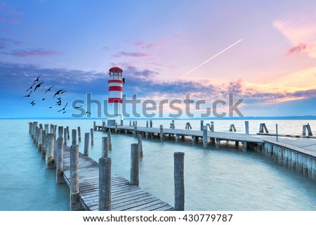 Lighthouse at sunset in Podersdorf am See, lake Neusiedler See, Burgenland, Austria                                 Royalty-Free Stock Photo #430779787