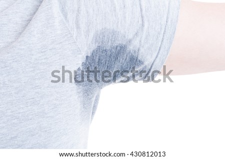 Arm raised with transpiration stain underarm isolated on white Royalty-Free Stock Photo #430812013