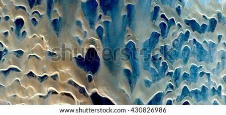hordes of Taliban chasing women, war, the exterminating angel,  photography of the deserts of Africa from the air. aerial view of desert landscapes, Genre: Abstract Naturalism