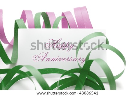 happy anniversary message - card with green and pink cotillions isolated on a white background