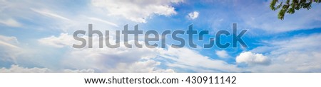 Beautiful blue sky and white cloud with leaf represent the sky and cloud concept related idea. Panorama Effect