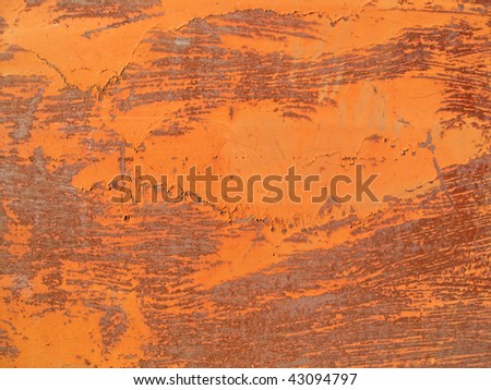 Texture of an old rusty metal surface with cracked paint