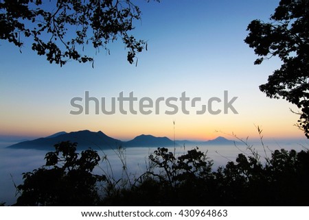 Fog and mountain valley landscape, Chiang Khan loei Thailand, Image contain certain grain or noise, soft focus.
