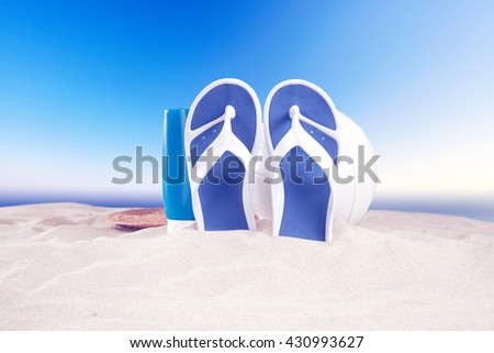 retro photo of beach and ball shoes and bottle 