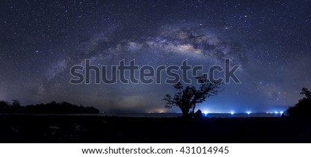 Milky Way galaxy panorama, Long exposure photograph, with grain.Image contain certain grain or noise and soft focus.
