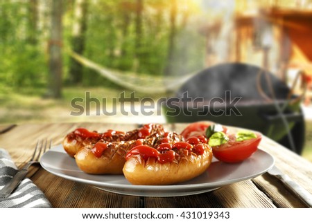 summer background of camping and tomatoes and grill and sausage 