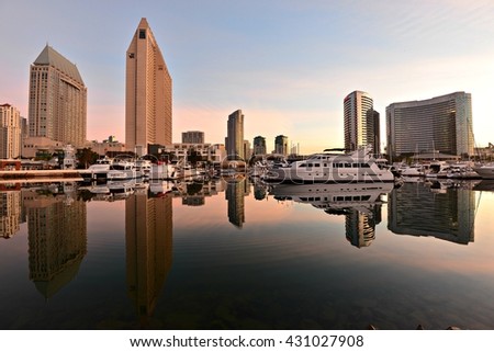 Sunrise seascape with panoramic view of the Marriott Hotel and Manchester Grand Hyatt Hotel  viewed from the San Diego Embarcadero Marina Park, in Southern California. 