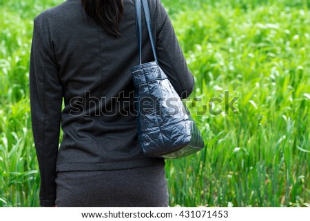 Asian business woman on green background