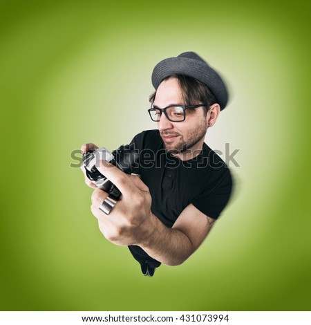 Funny Man with hat and photo camera selfie laugh looks like caricature of himself