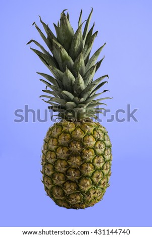 Pineapple over blue background