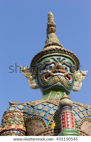 A giant standing guard at Temple of the Emerald Buddha