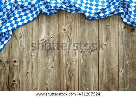 Rustic background for Oktoberfest with bavarian white and blue fabric