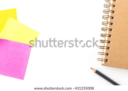 note book ,pen and note paper on white background