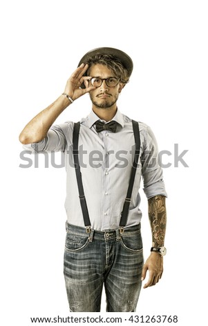 Stylish hipster with glasses, hat and bow-tie
