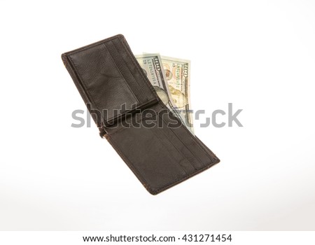 Money and wallet on the white isolated background.