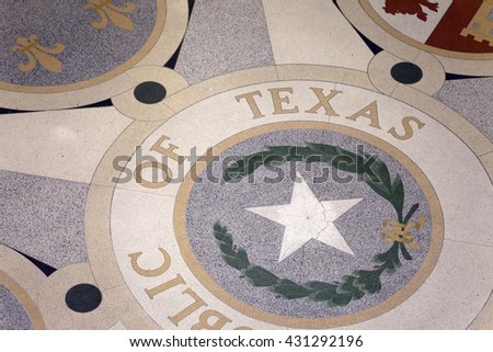 Ornamented marble floor with Republic of Texas state symbols