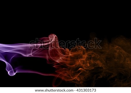 Movement of smoke,orange and purple smoke on black background,orange and purple ink background,smoke background ,beautiful smoke