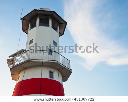 the lighthouse and beautiful cloud shape with close up style.  