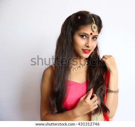 A Beautiful Young traditional Indian woman portrait on white background.