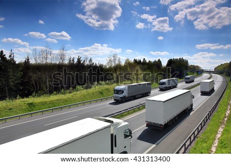 Truck transportation on the road Royalty-Free Stock Photo #431313400