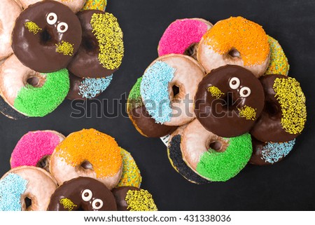 Top view, flat lay, donuts on chaalkboard