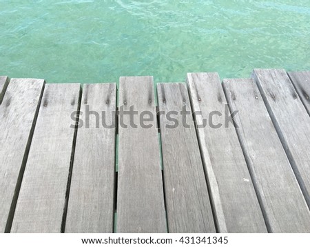 Wooden bridge on the way to the harbor Royalty-Free Stock Photo #431341345
