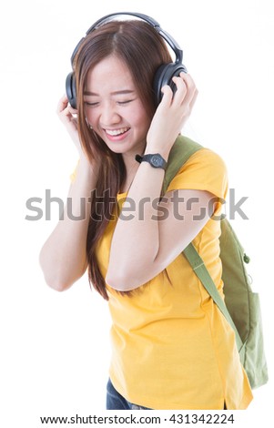 happy teen girl listening to music, full length, isolated on white