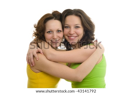 Picture of happy two sisters In colorful clothes, isolated on white background