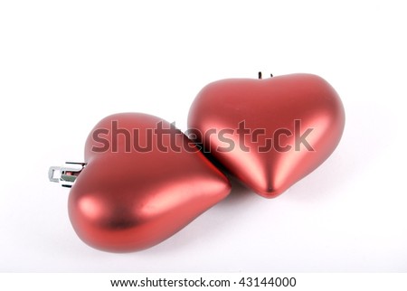 Red christmas hearts isolated on white
