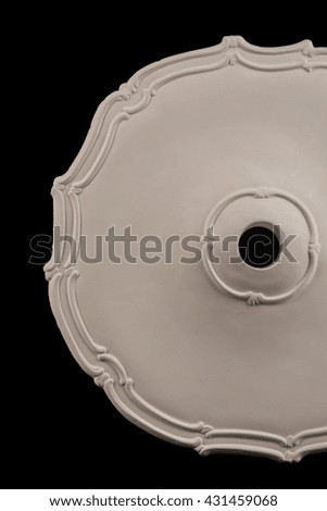 plaster round outlet on a black background