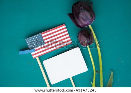 American (USA) flag, black tulips, patriotic cookies, coffee. concept for information holidays, dates, invitations. SOFT focus image