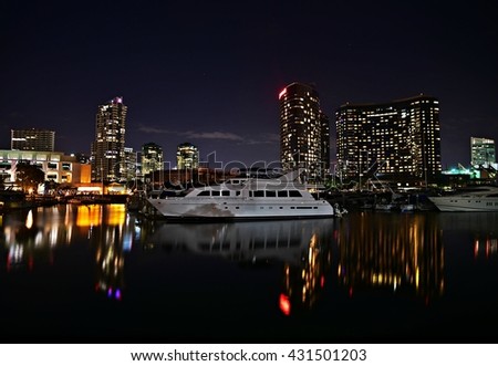 Nocturne seascape with panoramic view of the Marriott Hotel as seen from the San Diego Embarcadero Marina Park, in Southern California. 