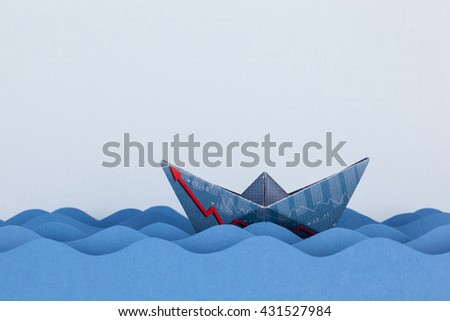 Paper boat made with financial document and swimming on paper waves.