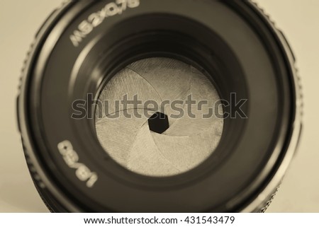 Diaphragm of a camera lens with vintage tone,Aperture inside lens close up shot.