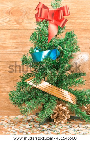 Composition of the christmas decorations. It arrangement on the wooden background.