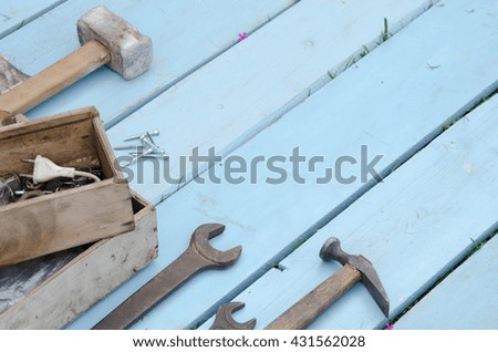 house remodel, consruction tools on a white table, Construction instruments, construction tools for the design of the house on a white background, screwdriver, ruler, nails, screws.