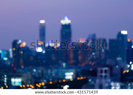 Abstract blurred bokeh lights night view, office building 