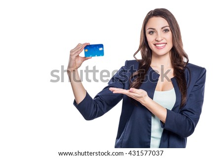 Portrait of stylish beautiful young woman isolated on white background. Woman holding credit card