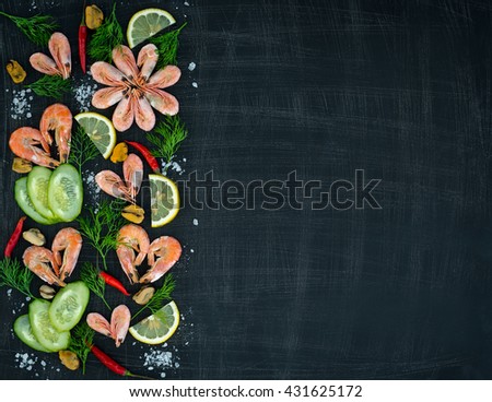 Shrimp , mussels, lemon , red onion and herbs . Background horizontal view from above. Space for text .