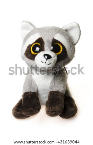 isolated image of Cute cuddly raccoon toy. Raccoon - small plush toy animal
