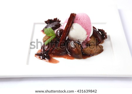ice-cream with decoration on white plate
