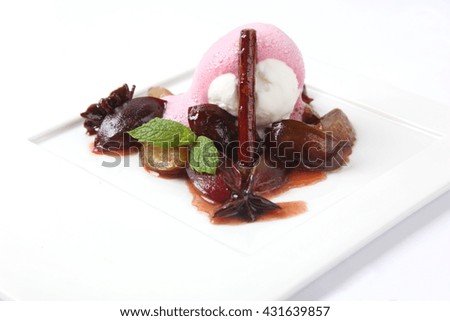 ice-cream with decoration on white plate